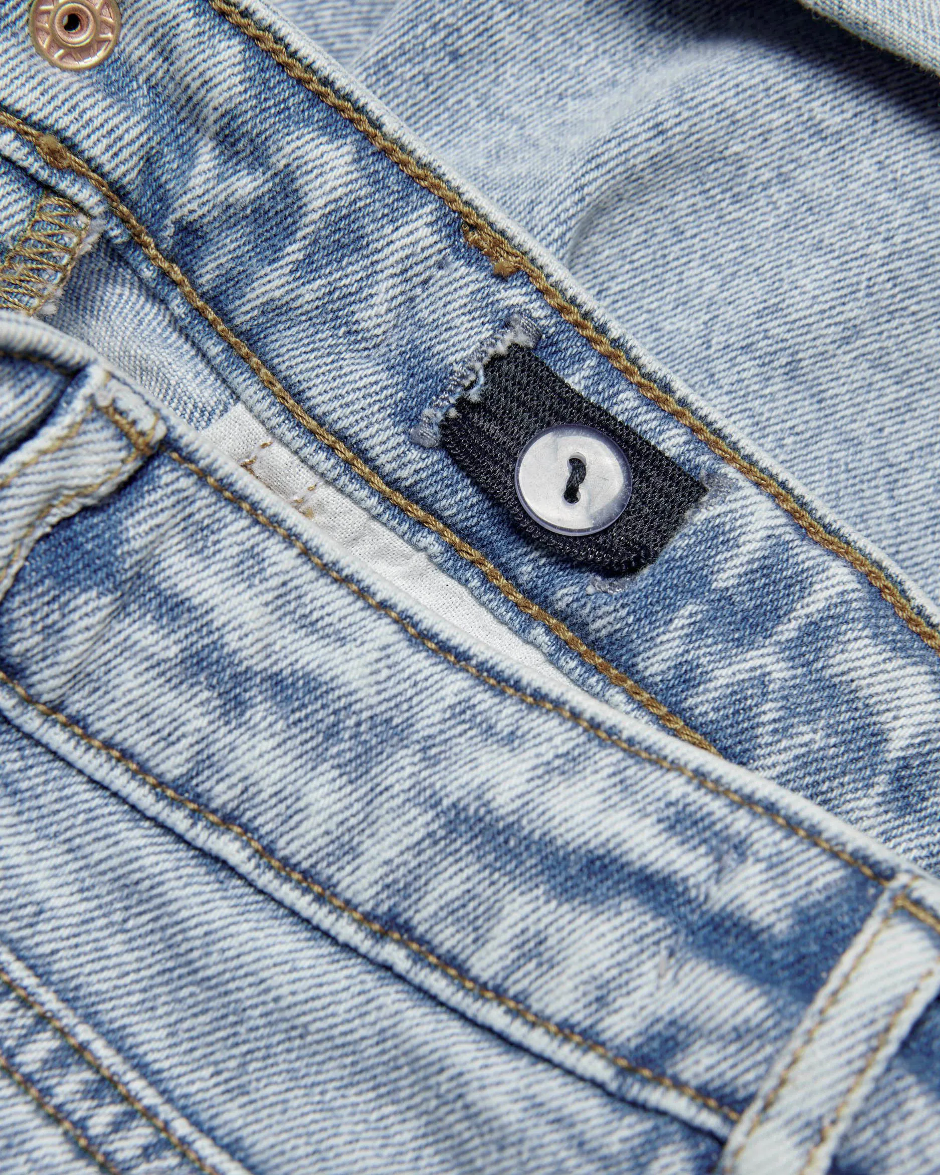 Bermuda in denim lavaggio chiaro stone washed con risvolti al fondo 10-14 anni
