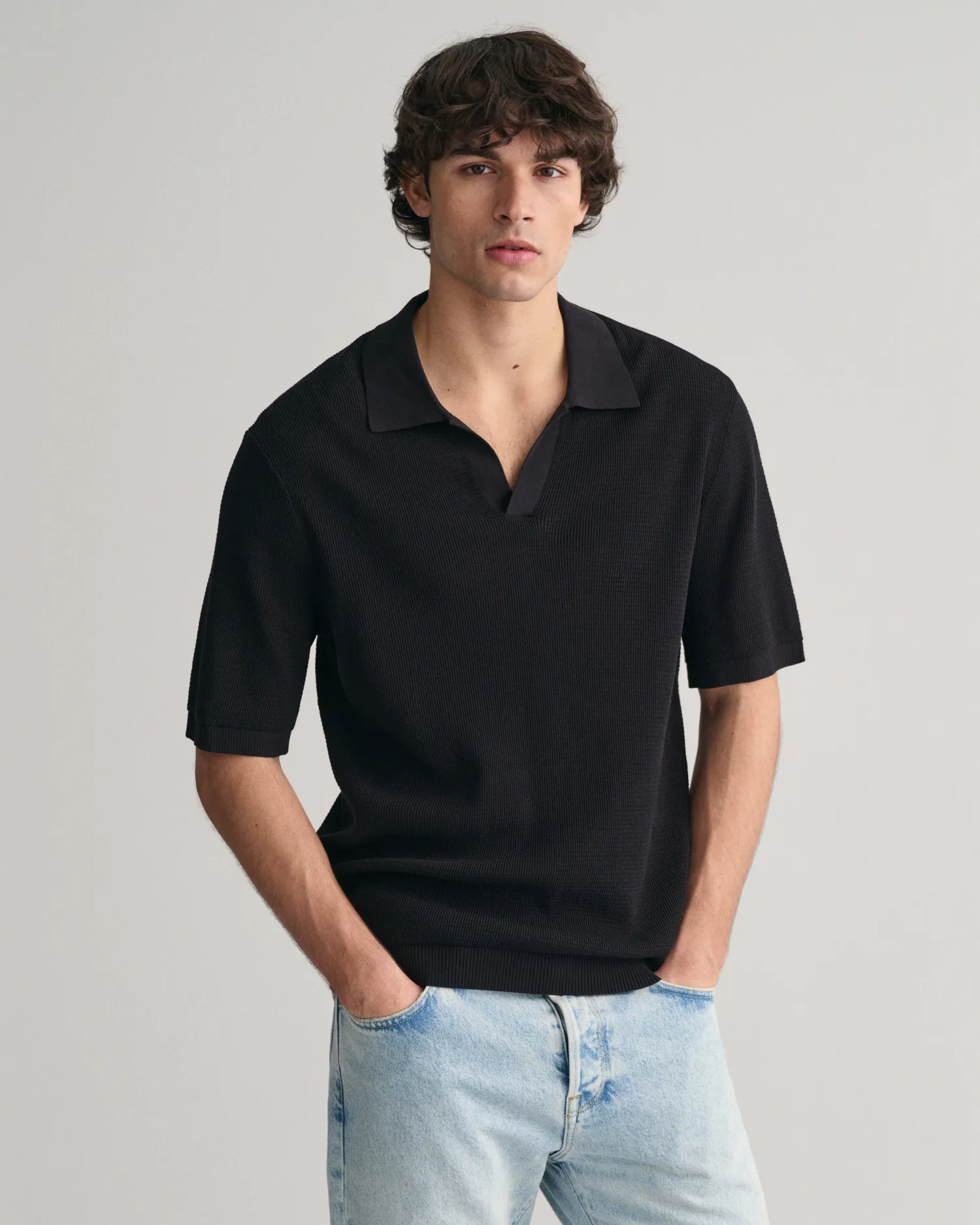 Polo in maglia aperta    