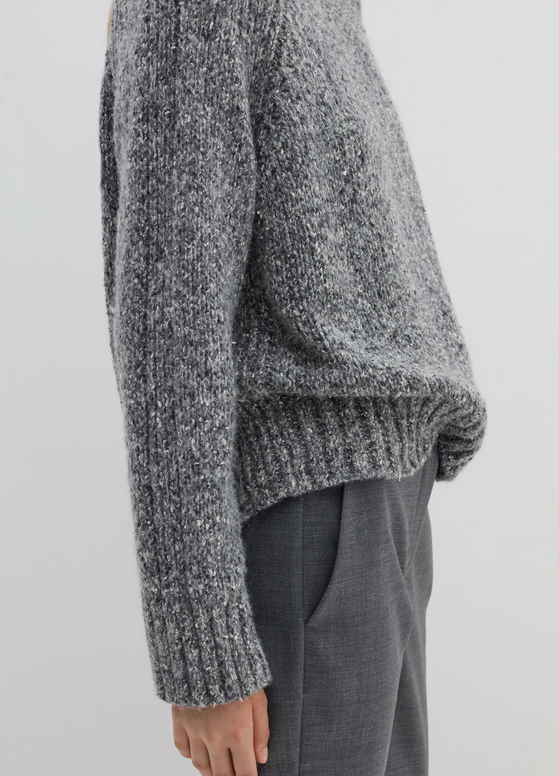 Pullover in filato bottonato di misto seta